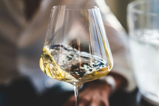 swirling-glass-of-white-wine